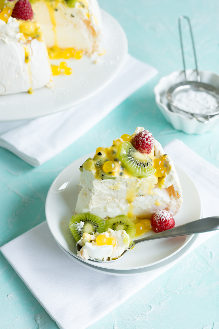 Vanilla Pavlova with Vanilla Bean Whip, Passion Fruit Curd and Pineapple Boba www.pineappleandcoconut.com