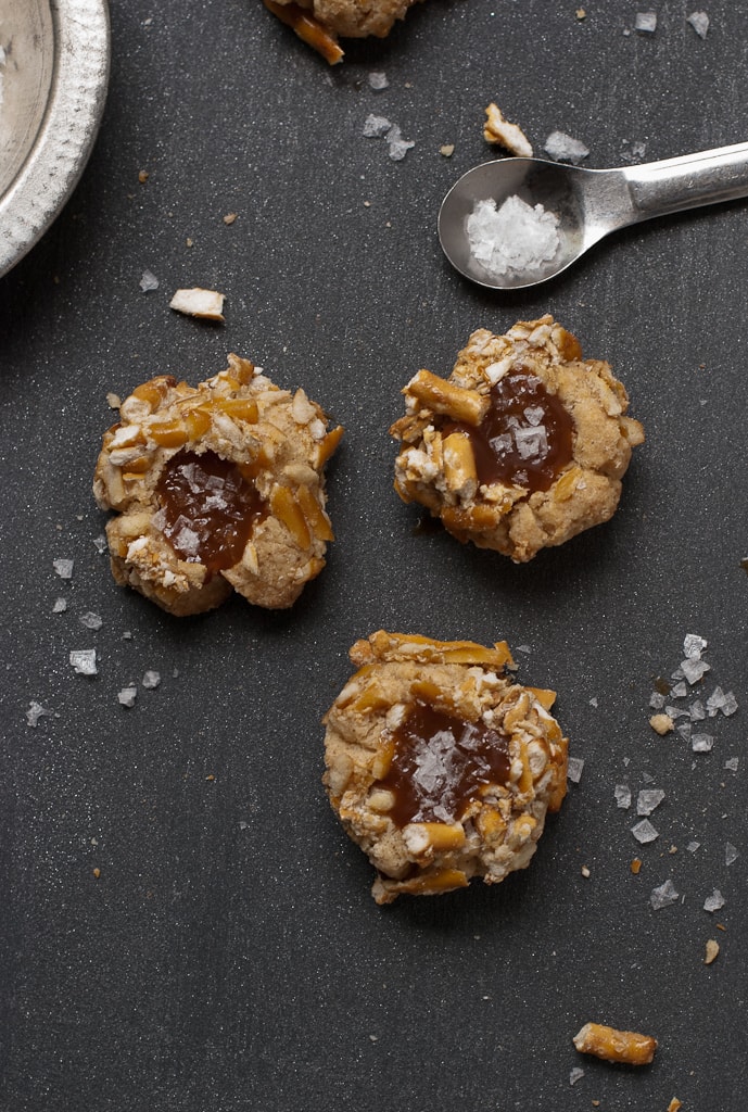 thumbprint cookies filled with caramel, small spoon with salt