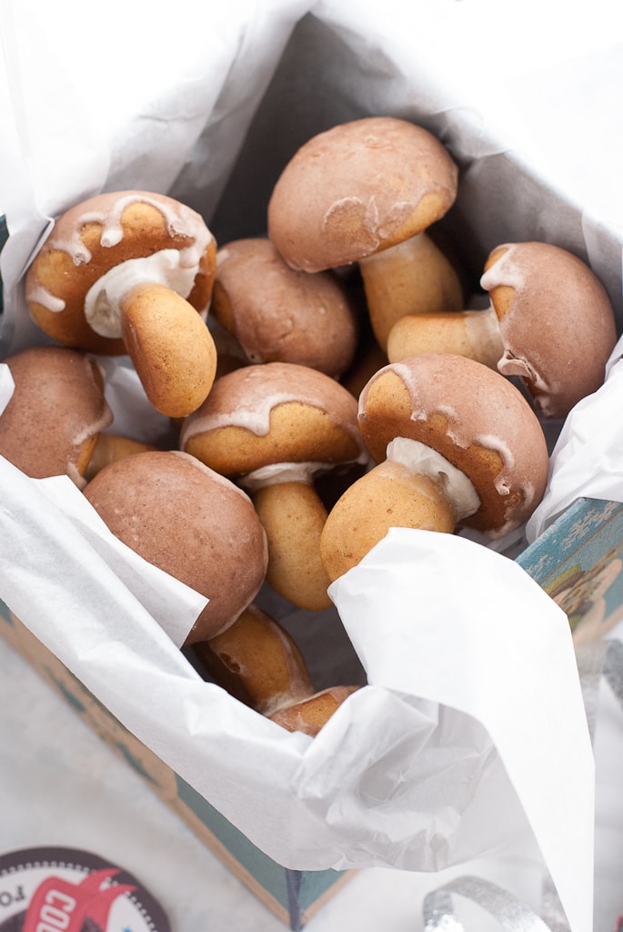 mushroom cookies in a tissue paper lined box