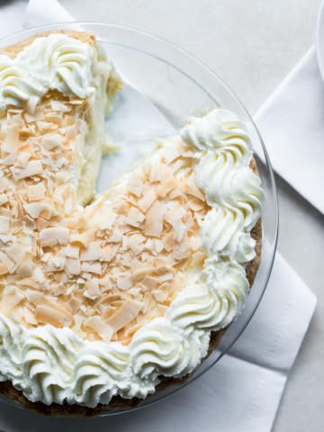 Boozy Coconut Cream Pie www.pineappleandcoconut.com #SlapstickFall #PieFight