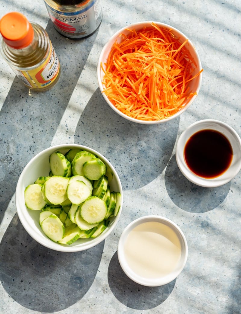 Quick pickled cucumber and carrots prep image www.pineappleandcoconut.com