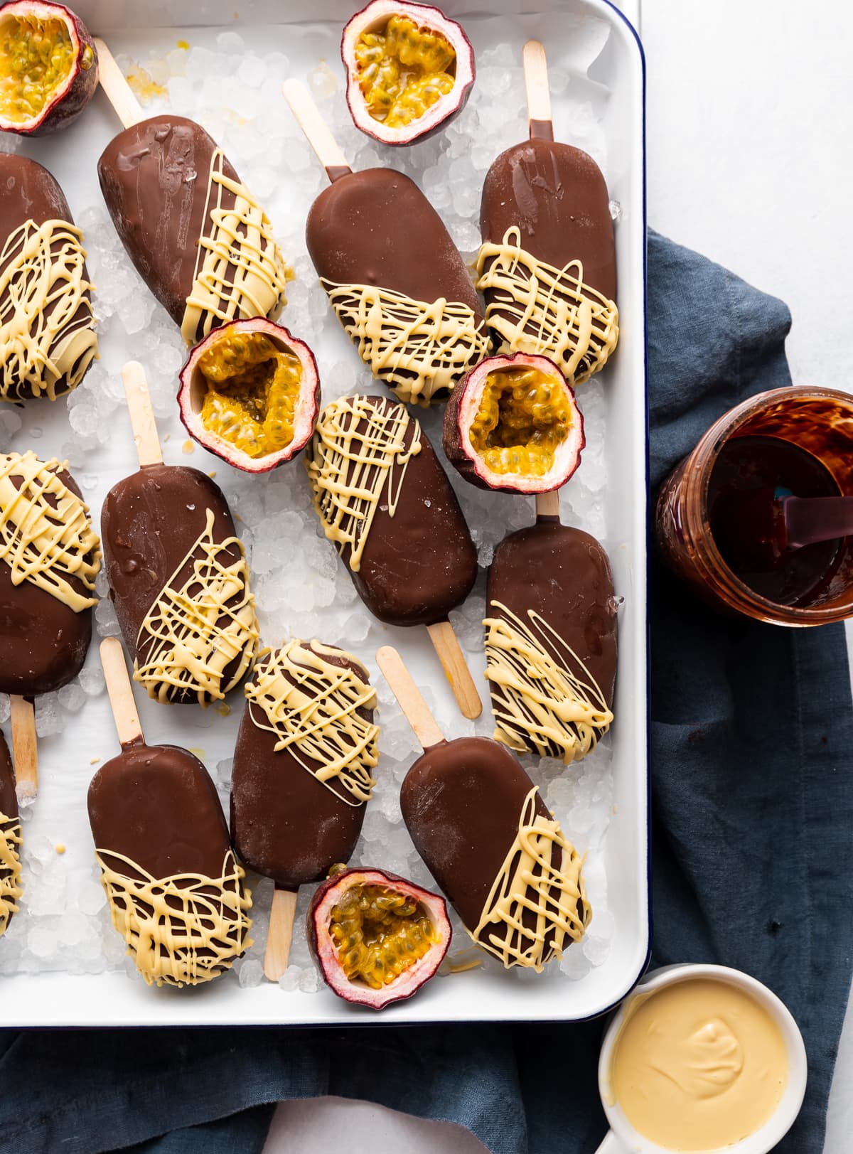 chocolate covered ice cream pops fresh passion fruits cut in half