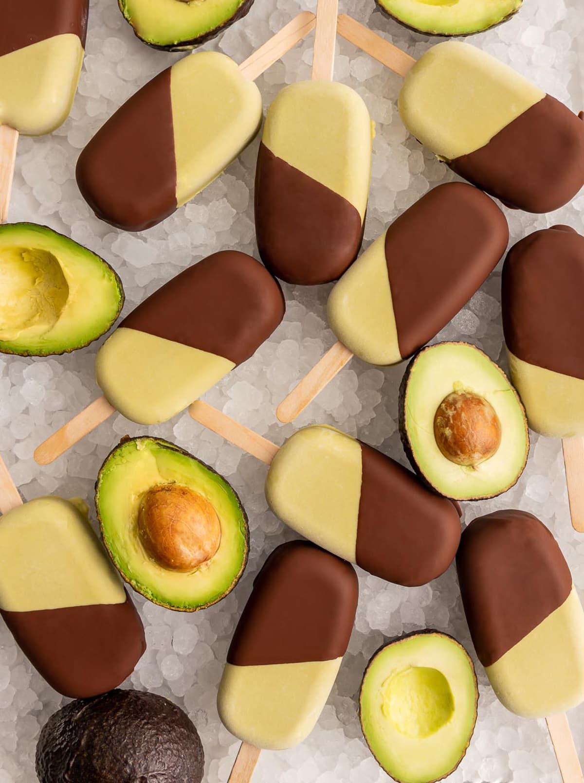 green avocado ice cream bars half dipped in chocolate 