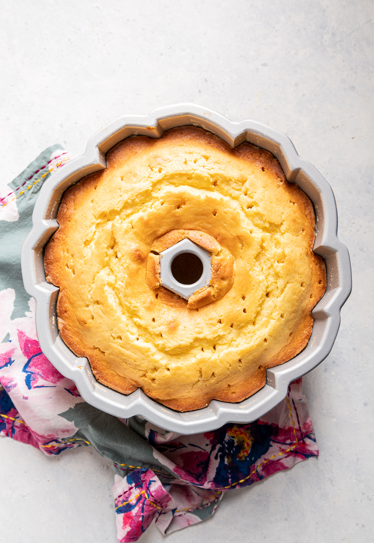 baked yellow bundt cake in bundt pan