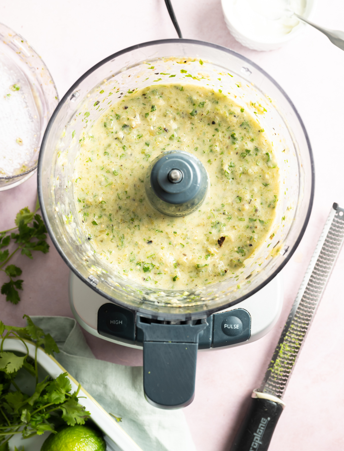 smooth pureed light green salsa in food processor