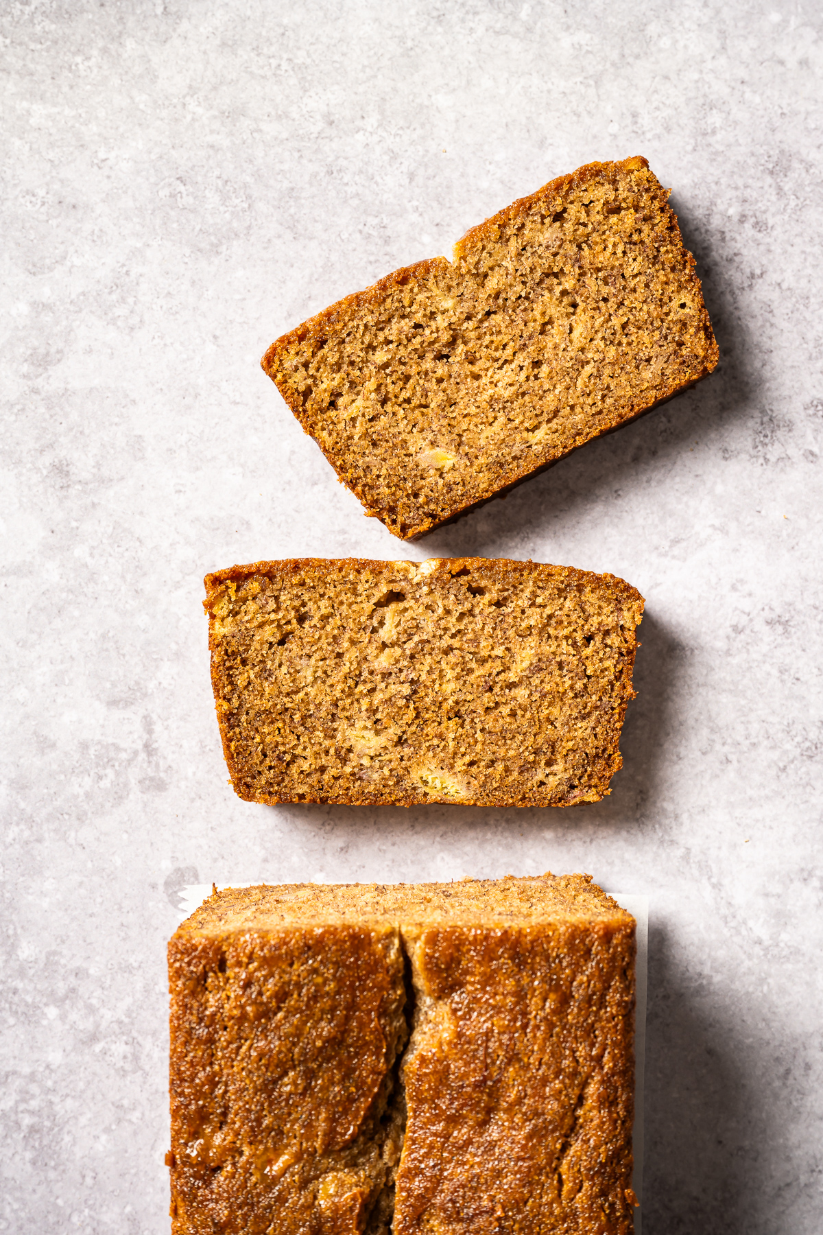 loaf of banana bread with two slices